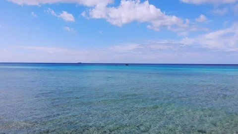 Aerial View of Sea Rocks in Clear Blue Waters, Grand Bahama, Bahamas Stock Footage 105536767