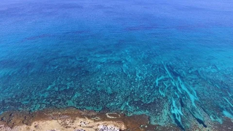 Aerial view of sea shore with coral reefs Stock Footage