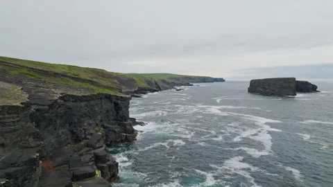 Aerial view of sea stack and cliffs, Kilkee coast, Ireland Stock Footage 347258878