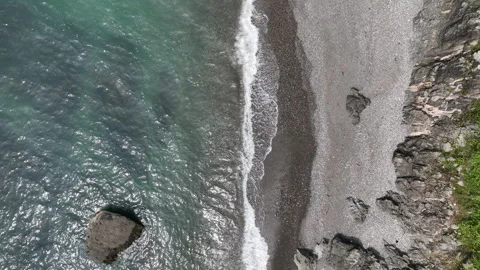 Aerial view of sea waves and fantastic Rocky coast in Tsikhisdziri Stock-Footage 243407565