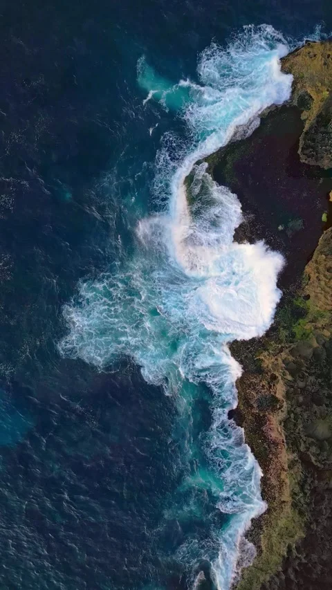 Aerial view Sea Waves Breaking in Reefs of Coast Mountain Cliff 4k 스톡 동영상 285408622
