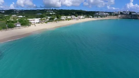 Aerial view of the sea waves touching the sandy beach of St. Martin, Baie Longue Stock Footage 196609921