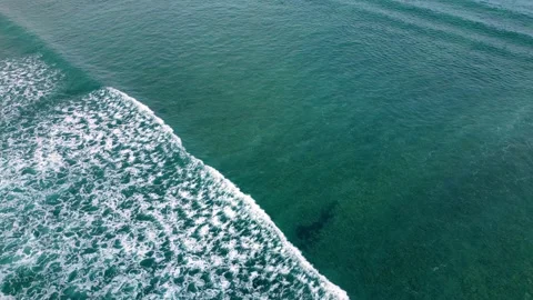 Aerial view of the sea waves. View of the dark blue sea and the approaching.. Stock Footage 238876996