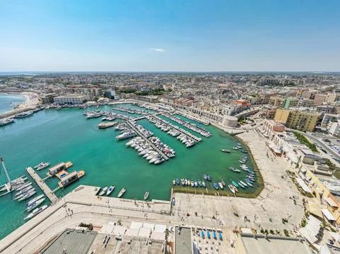 Aerial view of seafront and old town Bisceglie in Puglia with drone. Stock Photos