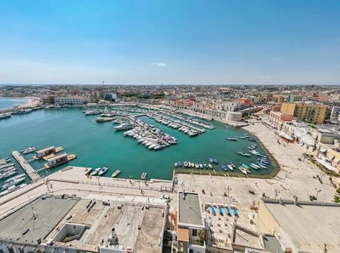 Aerial view of seafront and old town Bisceglie in Puglia with drone. Stock Photos