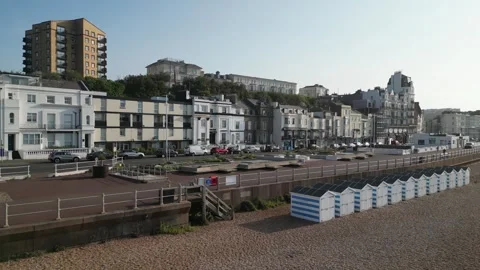 Aerial view of the seafront, beach and beach huts  at Hastings Stockbeeldmateriaal 242913663