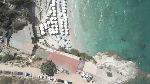 Aerial view of Seagull Beach with turquoise water and cliffs in Ksamil, Albania Stock Footage 344854137