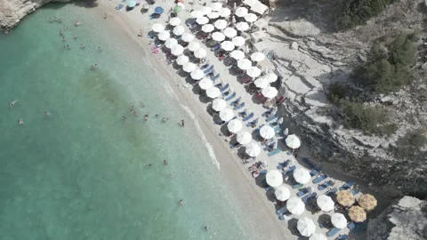 Aerial view of Seagull Beach with turquoise water and cliffs in Ksamil, Albania Stock Footage 344857704