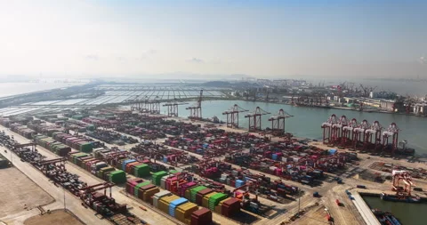 Aerial view of seaport cargo containers. Loading freight at harbor. Marine dock. Stock Footage 318970437