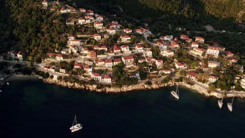 Aerial view of the seaside town on a sunset. Seaside town in Greece. Stock Footage 282095814