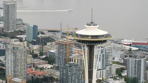 Aerial View of Seattle Space Needle with City and Shipyard Stock Footage 114362884