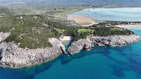 Aerial view of secluded beach of Glossa near Voidokilia, Pylos, Greece Video stock 303185249