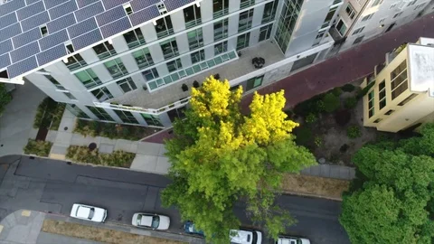 Aerial view of a second-floor terrace with solar panels Stock Footage 83947103
