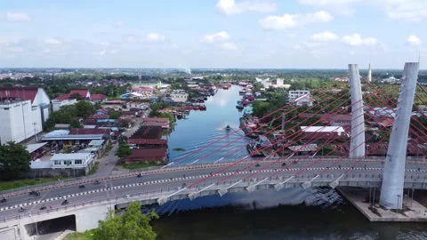Aerial view of the Sei Alalak Bridge located in Banjarmasin which is known as th Stock Footage 274470761
