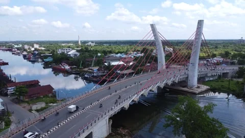 Aerial view of the Sei Alalak Bridge located in Banjarmasin which is known as th Stock Footage 274470879