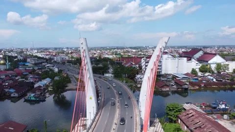Aerial view of the Sei Alalak Bridge located in Banjarmasin Stock Footage 274473268