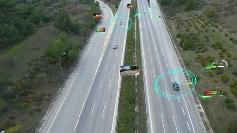Aerial view of Self Driving Autonomous Cars with HUD Elements on City Highway Stock Footage 225136951