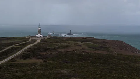 Aerial view of Semaphore of pointe du raz with clouds and rains coming Stock Footage 131470491