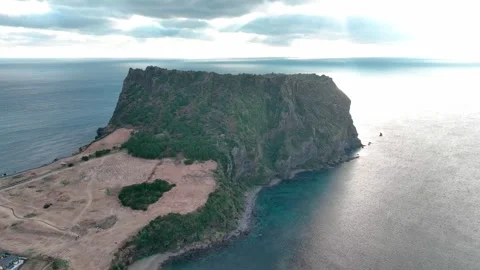 Aerial view of Seongsan Ilchulbong Peak (Sunrise Peak) in Jeju Island Stock Footage 296341953