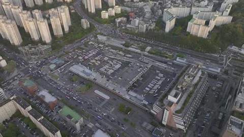Aerial view of Seoul Express Bus Terminal at sunset with heavy traffic Stock Footage 333202675