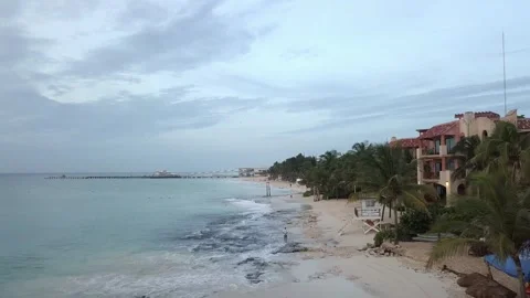 Aerial View of Serene Beachfront in Tulum, Mexico at Dusk Stock Footage 312079029