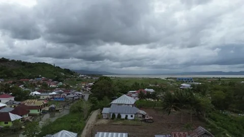 Aerial view of settlements along the river Video stock 253844433