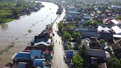 Aerial view of settlements on the banks of the river and densely populated .. Stock Footage 319971109