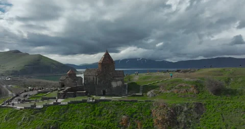 Aerial view of Sevanavank monastery with Lake Sevan in the background, Armenia Vidéo 338008042