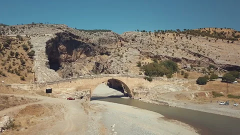 Aerial view of Severan Bridge and Chabinas creek at Adiyaman province, Turkey Stock Footage 258612130