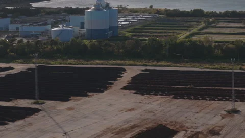 Aerial view of sewage sludge composting windrows at wastewater treatment plant. Vídeos de archivo 344352405