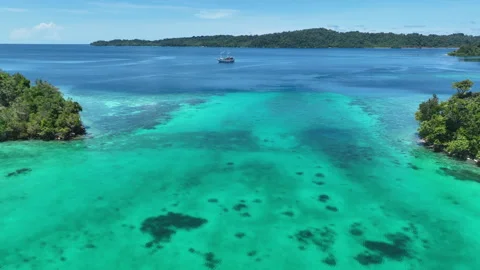 Aerial View of Shallow Reef and Tropical Islands in Indonesia Stock Footage 242514275