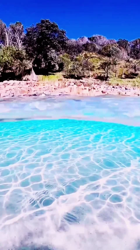 Aerial View of Shallow Turquoise Ocean with Rippling Sandy Bottom 库存影片 336903649