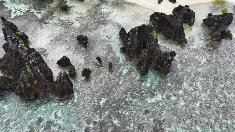 Aerial View of Sharp, Limestone Islands and Beach in Misool, Raja Ampat Stock Footage 325516734