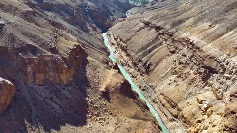 Aerial View of Sheer Rocky Cliffs and Narrow Canyon in High Himalayas Stockbeeldmateriaal 333065857