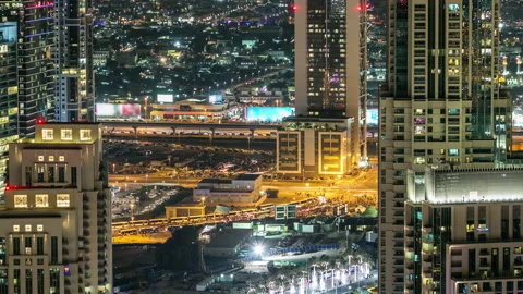 Aerial view of Sheikh Zayed road timelapse with night traffic and illuminated Stock Footage 147318394