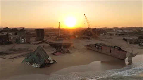 Aerial view of ship breaking yard at sunset, Pakistan. Stock Footage 331860116
