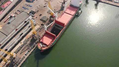 Aerial view of the ship loading near the berth in the port. Loading the wire rod Stock Footage 88356238