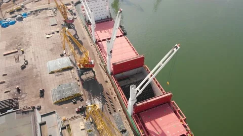 Aerial view of the ship loading near the berth in the port. Loading the wire rod Stock Footage 88358129