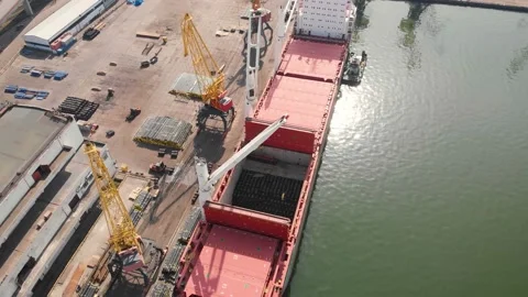 Aerial view of the ship loading near the berth in the port. Loading the wire rod Stock Footage 88360616