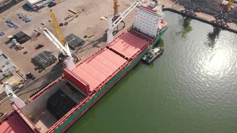 Aerial view of the ship loading near the berth in the port. Loading the wire rod Stock Footage 88367061