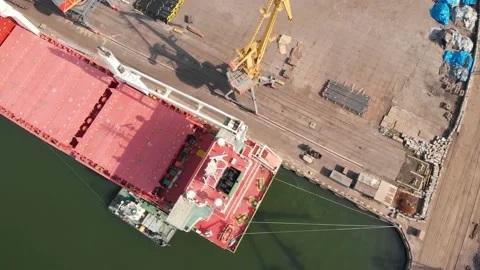 Aerial view of the ship loading near the berth in the port. Loading the wire rod Stock Footage 88367520