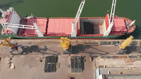 Aerial view of the ship loading near the berth in the port. Loading the wire rod Stock Footage 88369330