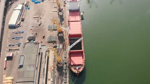Aerial view of the ship loading near the berth in the port. Loading the wire rod Stock Footage 88372533
