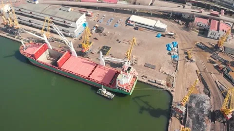 Aerial view of the ship loading near the berth in the port. Loading the wire rod Stock Footage 88377514