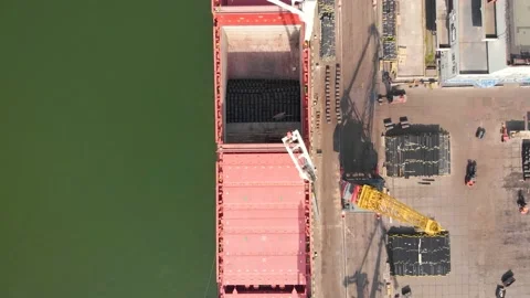 Aerial view of the ship loading near the berth in the port. Loading the wire rod Stock Footage 88378541