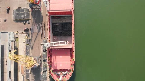 Aerial view of the ship loading near the berth in the port. Loading the wire rod Stock Footage 88381082