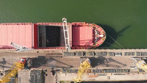 Aerial view of the ship loading near the berth in the port. Loading the wire rod Stock Footage 88382106