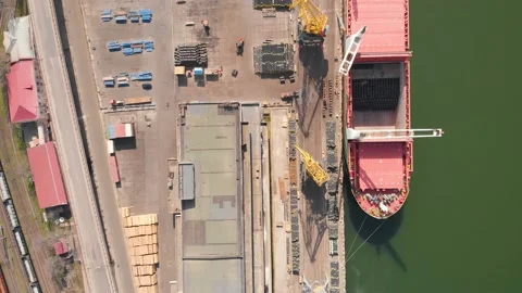 Aerial view of the ship loading near the berth in the port. Loading the wire rod Stock Footage 88383013