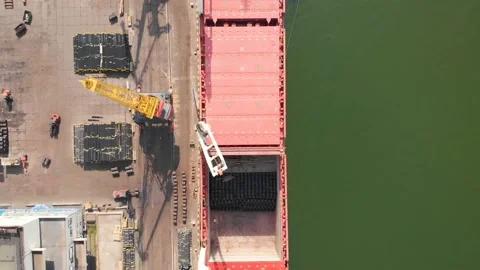 Aerial view of the ship loading near the berth in the port. Loading the wire rod Stock Footage 88384092