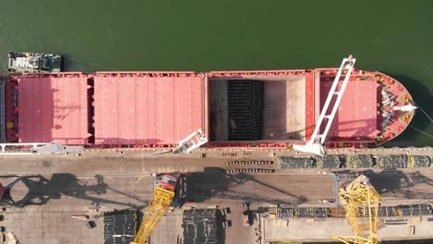 Aerial view of the ship loading near the berth in the port. Loading the wire rod Stock Footage 88385068